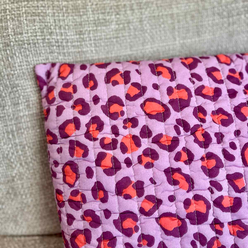 
                      
                        COUSSIN LÉOPARD
                      
                    