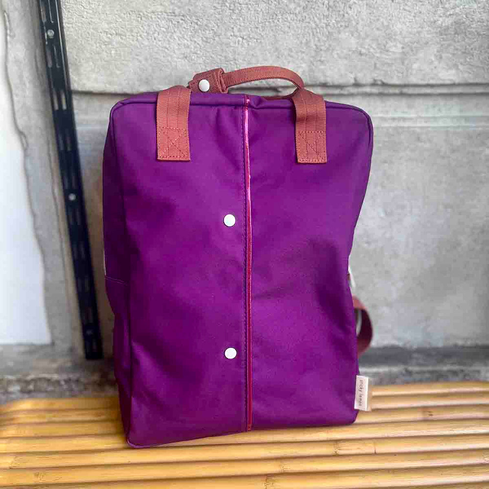 
                      
                        GRAND SAC A DOS
                      
                    