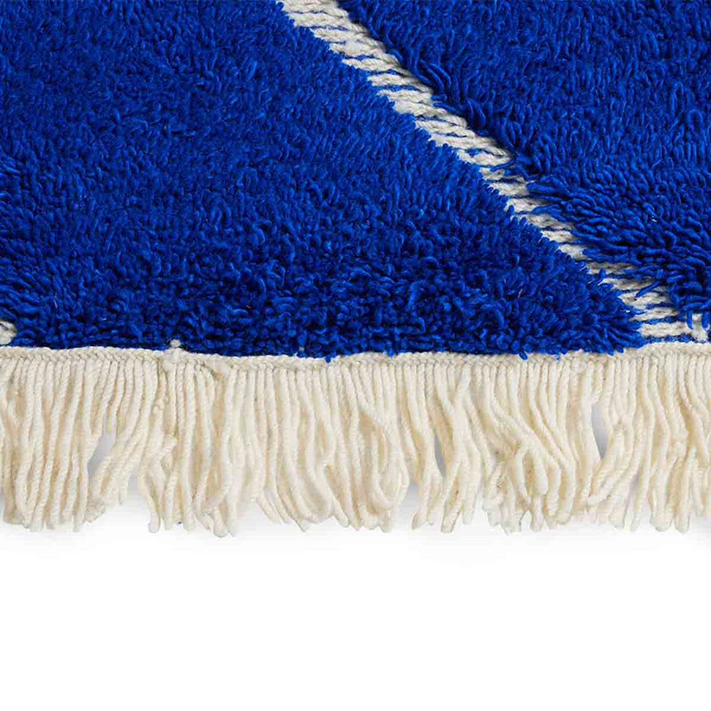 
                      
                        TAPIS LAINE BLEU
                      
                    